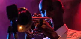 A man plays the trumpet at The Blue Room in Kansas City