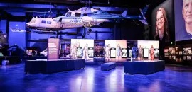 Photo of two suspended military helicopters in an exhibit space at the Sullenberger Aviation Museum.
