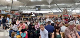 image of travelers stuck in an airport