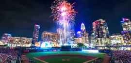 Truist Field, with fireworks and the skyline of Charlotte, North Carolina, in the background.