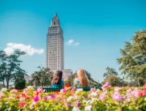 Capitol Building of Baton Rouge surrounded by flowers