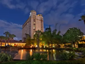 Exterior shot at night of DoubleTree by Hilton Orlando at SeaWorld