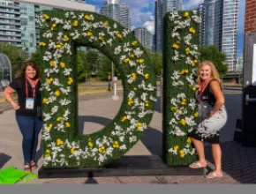 Attendees pose outside of Steam Whistle Complex during Destinations International's Annual Convention in Toronto