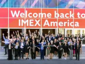 IMEX America staff welcoming attendees.