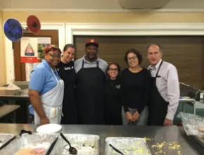 Corporate volunteers cooked and served breakfast at Miriam’s Kitchen