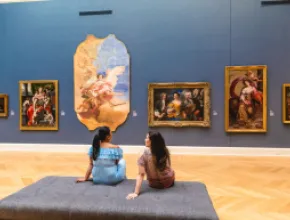 Two people observing art at RISD Museum in Providence, Rhode Island