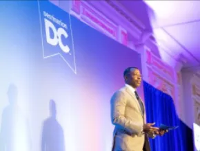 Photo of Elliott L. Ferguson II, president and CEO, Destination DC, speaking at Marketing Outlook Meeting 2022. at