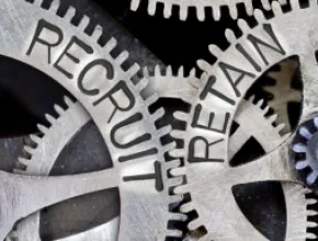 Graphic of gears relating to employee retention.