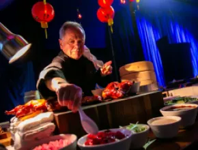 Photo of Wolfgang Puck cooking at Atlanta's Georgia Aquarium.