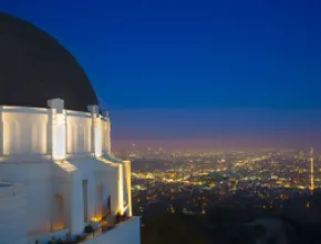 Griffith Observatory Dome and cityscape at night