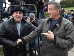 Mike Kunda and Sylvester Stallone shaking hands