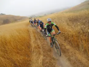 Photo of people riding mountain bikes