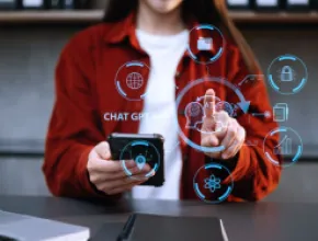 Photo of a woman with virtual reality technology overlays in front of her.