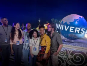 Attendees in front of Universal Orlando globe