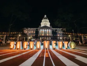 Photo of state capitol of California during night at Legends of Wine 2023 festival.