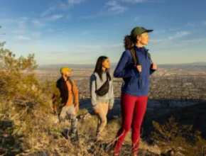 Three people hiking on Phoenix trails