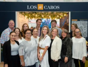 Photo of Terramar DMC's staff at their booth at IMEX America 2024.