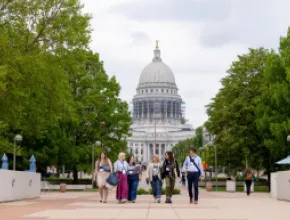 Attendees walking in front of Wisconsin State Capitol