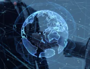 Globe graphic with hands shaking