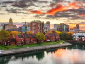 Skyline of Buffalo of night with bright lights.