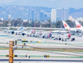 line of planes on tarmac