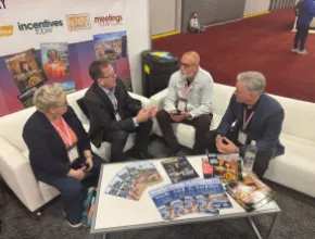Richard Bliss in Meetings Today booth. 