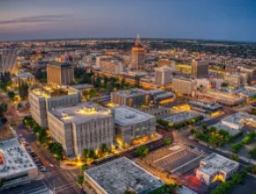 Aerial view of the Fresno, California skyline at dusk.