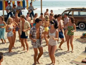 Gemini-generated AI image of people dancing to a band at a beach party.