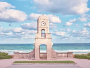 Worth Avenue Clock Tower, with the ocean in the background.