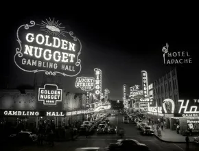 Fremont Street, 1954, with Golden Nugget neon sign in foreground.