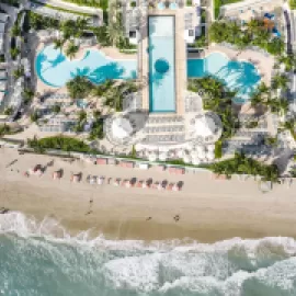 Aerial shot of the beachfront at The Diplomat Beach Resort Hollywood, Curio Collection by Hilton