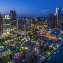 Hart Plaza at night with skyline