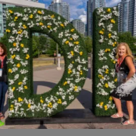 Attendees pose outside of Steam Whistle Complex during Destinations International's Annual Convention in Toronto