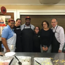 Corporate volunteers cooked and served breakfast at Miriam’s Kitchen