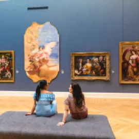 Two people observing art at RISD Museum in Providence, Rhode Island