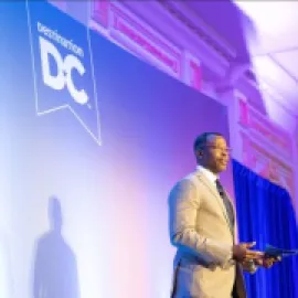 Photo of Elliott L. Ferguson II, president and CEO, Destination DC, speaking at Marketing Outlook Meeting 2022. at 