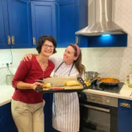 Learning to cook chicken paprikash from local chef, Brigi, in Budapest, Hungary