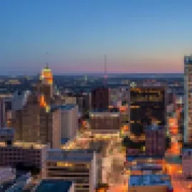 Panoramic photo of San Antonio skyline.