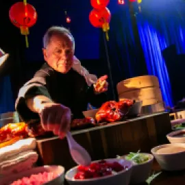 Photo of Wolfgang Puck cooking at Atlanta's Georgia Aquarium.