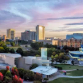 Photo of Atlanta skyline and Centennial Olympic Park.