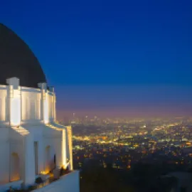 Griffith Observatory Dome and cityscape at night