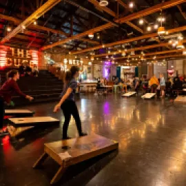 Photo of people playing cornhole at The Duce lounge in Phoenix.