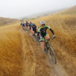 Photo of people riding mountain bikes