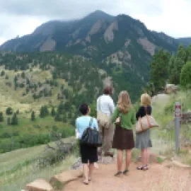 Photo of people looking out over the NCAR Weather Trail Overlook in Boulder