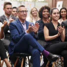 Group of attendees sitting in the audience