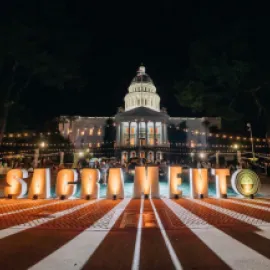 Photo of state capitol of California during night at Legends of Wine 2023 festival.