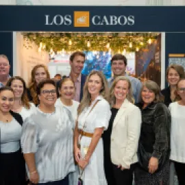 Photo of Terramar DMC's staff at their booth at IMEX America 2024.