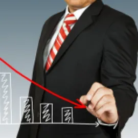Graphic of a business man tracing a downward arrow.
