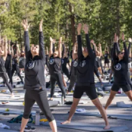 Attendees practice Yin Yoga at the 2024 Caesars Global Wellness Summit. Credit: Caesars Entertainment.