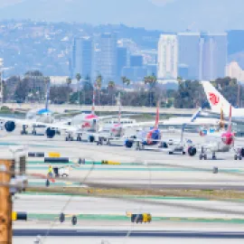 line of planes on tarmac